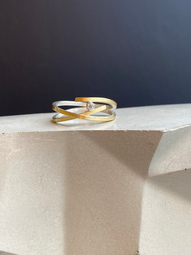 Delicate Silver And Gold Crossover Ring With Diamond