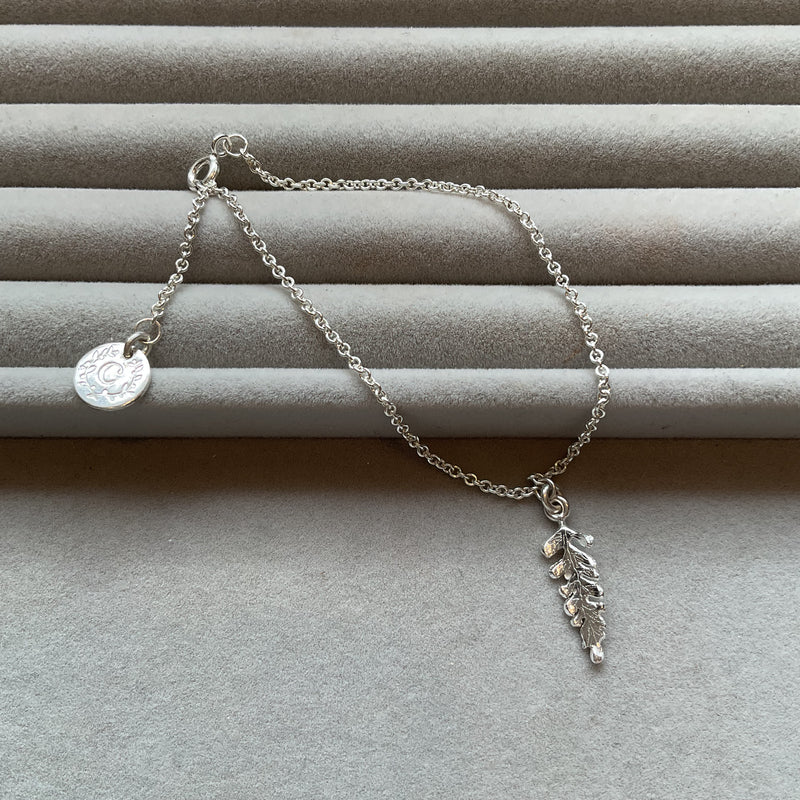 Tiny Fern Charm On Adjustable Fine Trace Bracelet
