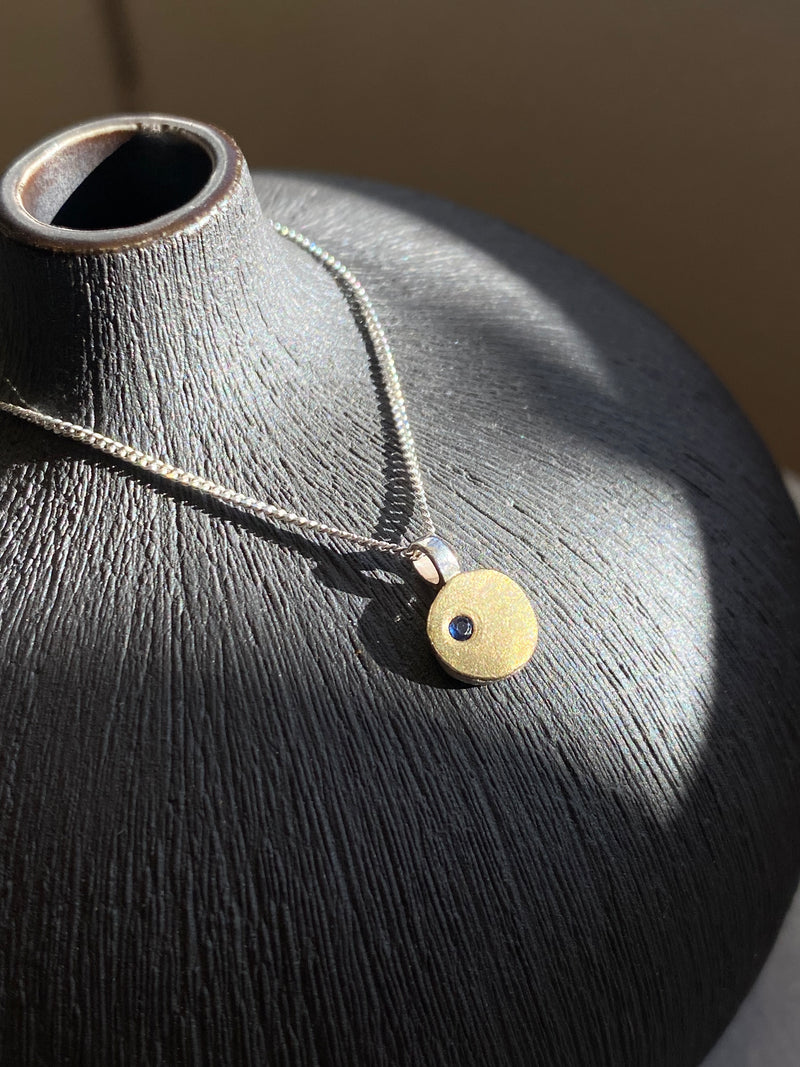 Single Drop Pebble Pendant With Sapphire