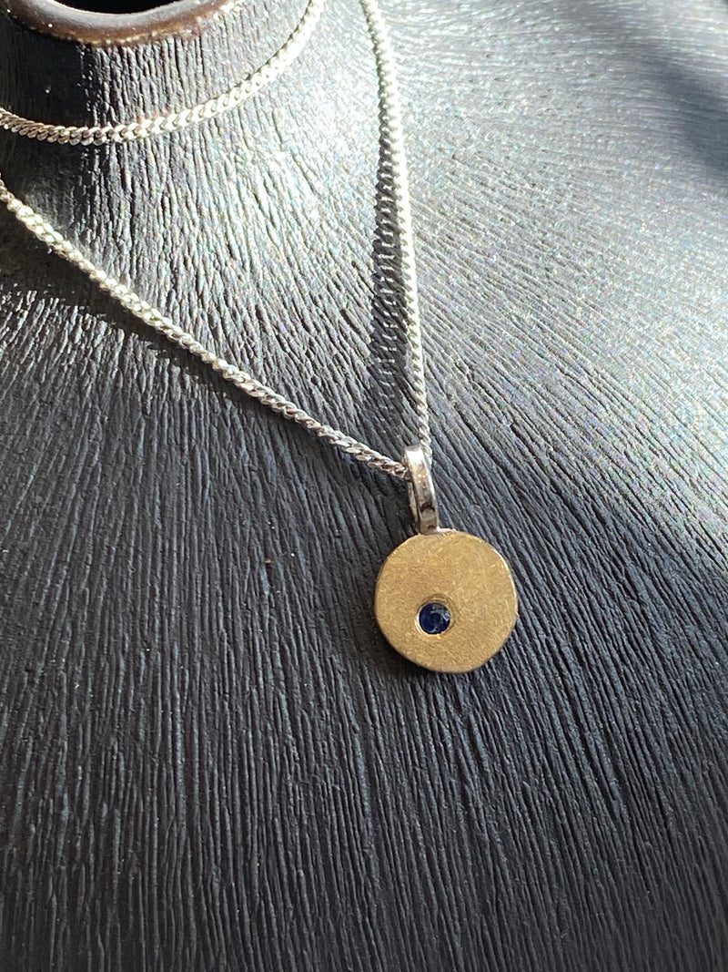 Single Drop Pebble Pendant With Sapphire