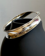 Twist Silver Bangle