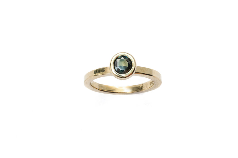 Our Dotty Dot Solitaire Teal Sapphire set on a Plain Square Band