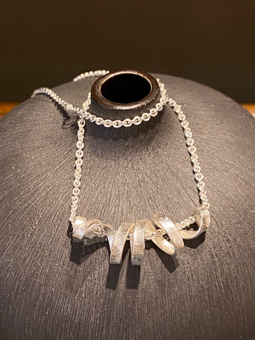 Spin Pendant On Trace Chain