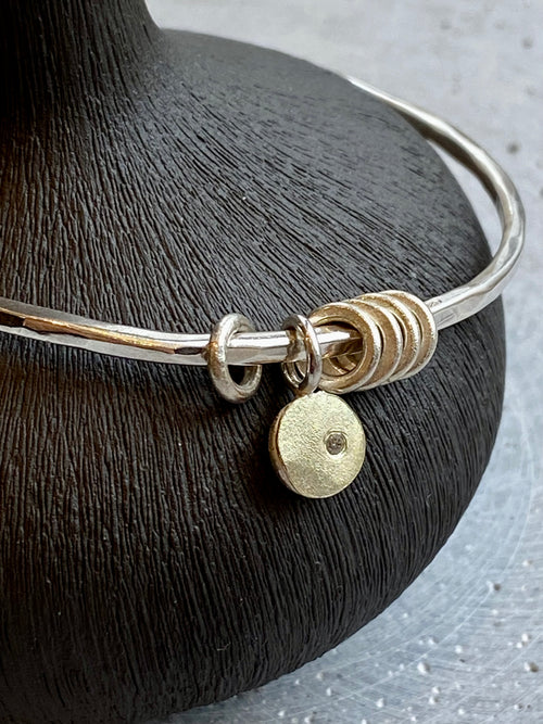 Silver Bangle With Gold Pebble And Diamond