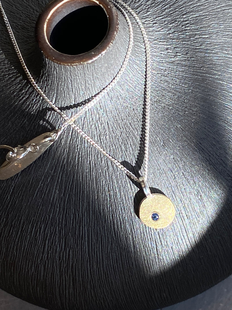 Single Drop Pebble Pendant With Sapphire