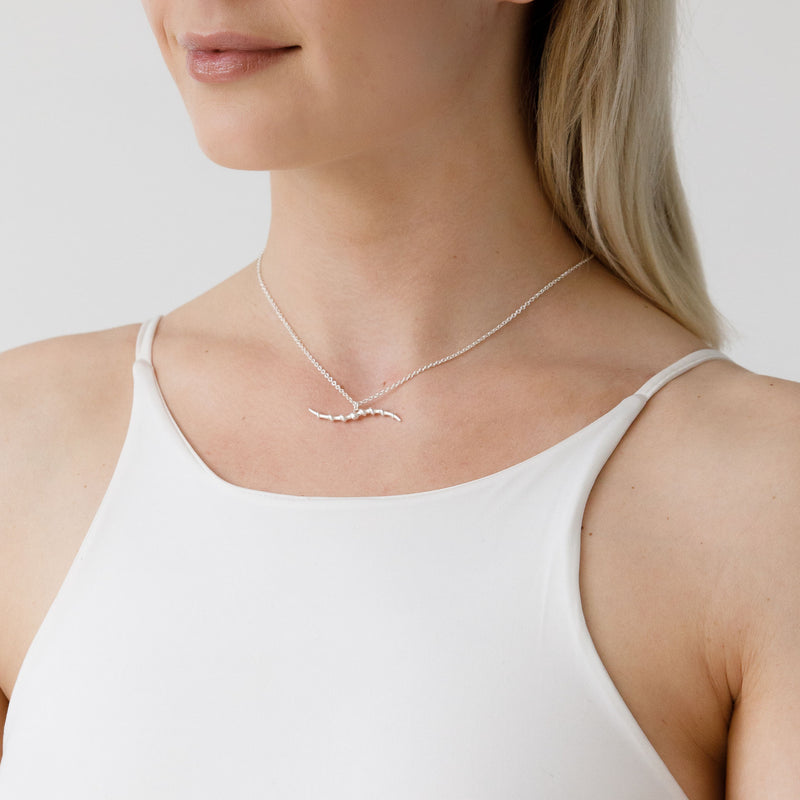 Gazelle Collection Silver Wave Bar Statement Pendant